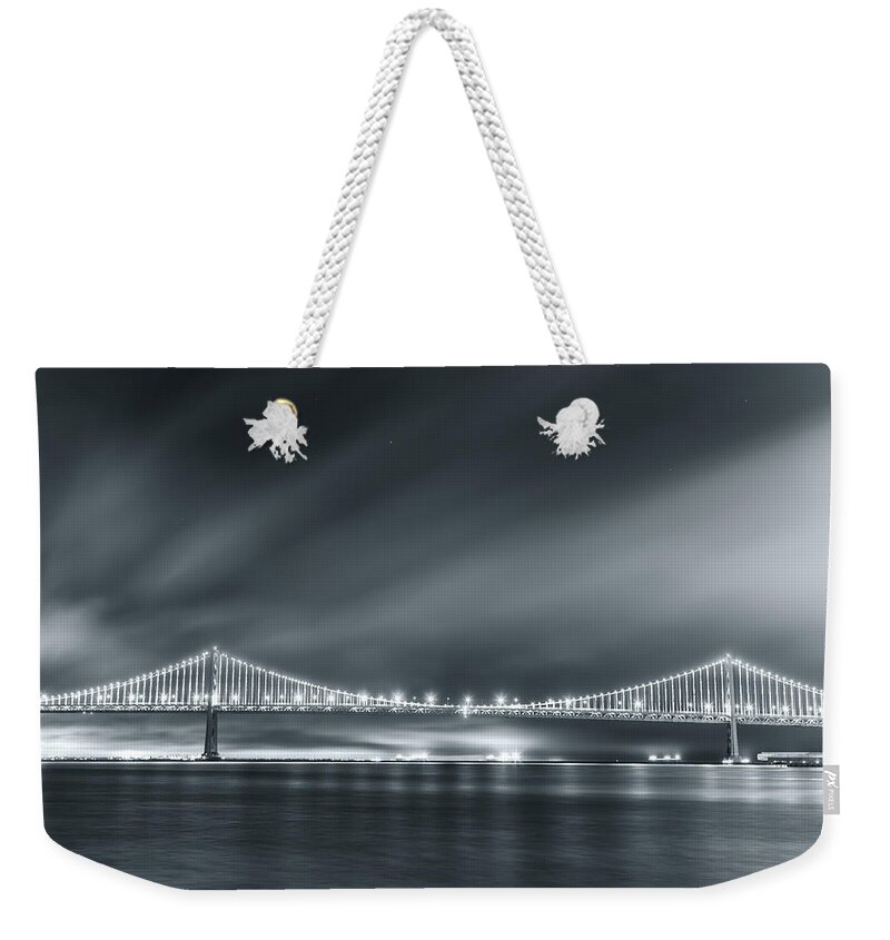 City Weekender Tote Bag featuring the photograph Bay Bridge and The Fog by Jonathan Nguyen