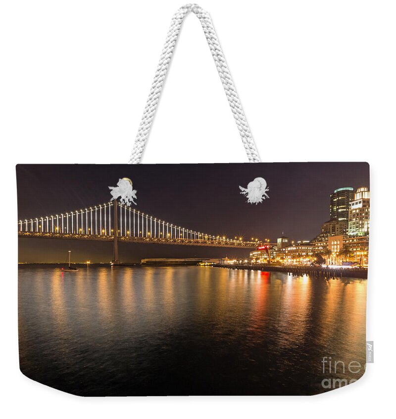Bay Bridge Weekender Tote Bag featuring the photograph Bay Bridge Lights and City by Kate Brown