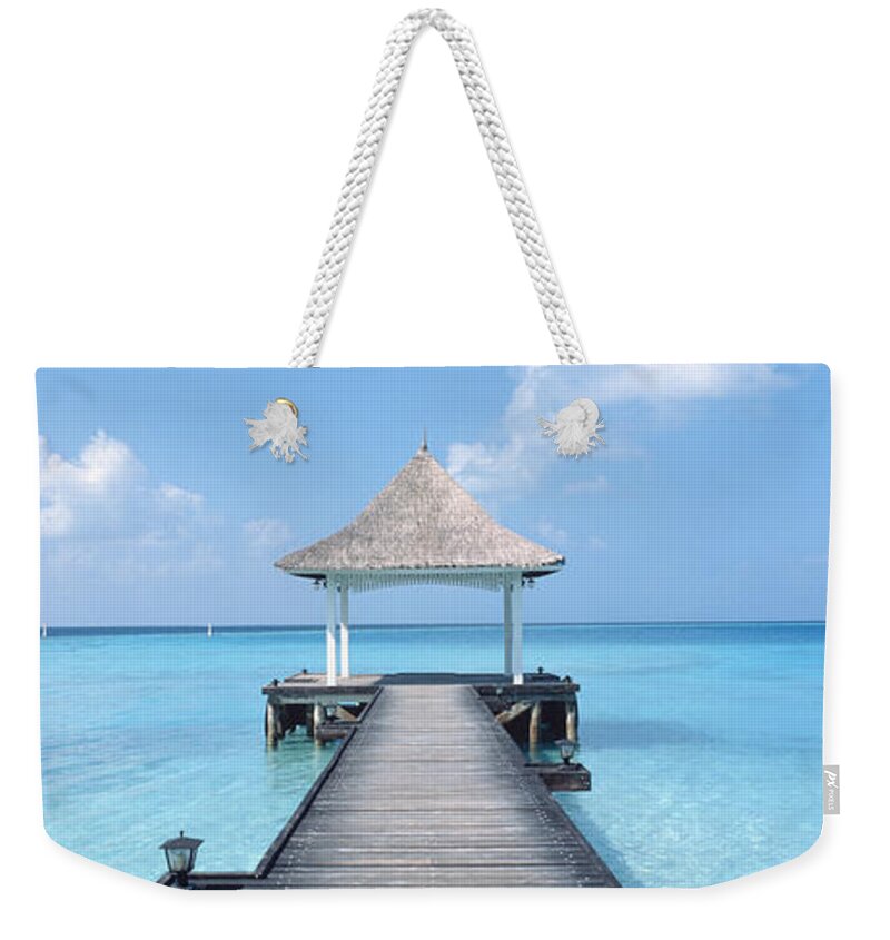 Photography Weekender Tote Bag featuring the photograph Beach & Pier The Maldives by Panoramic Images