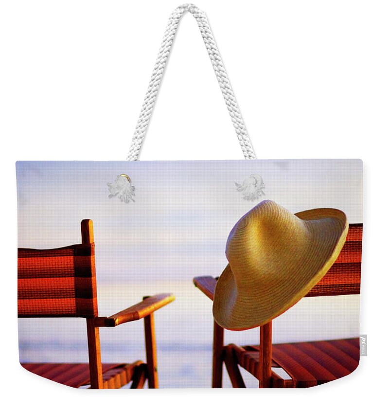 Water's Edge Weekender Tote Bag featuring the photograph Beach Chairs by Stevecoleimages