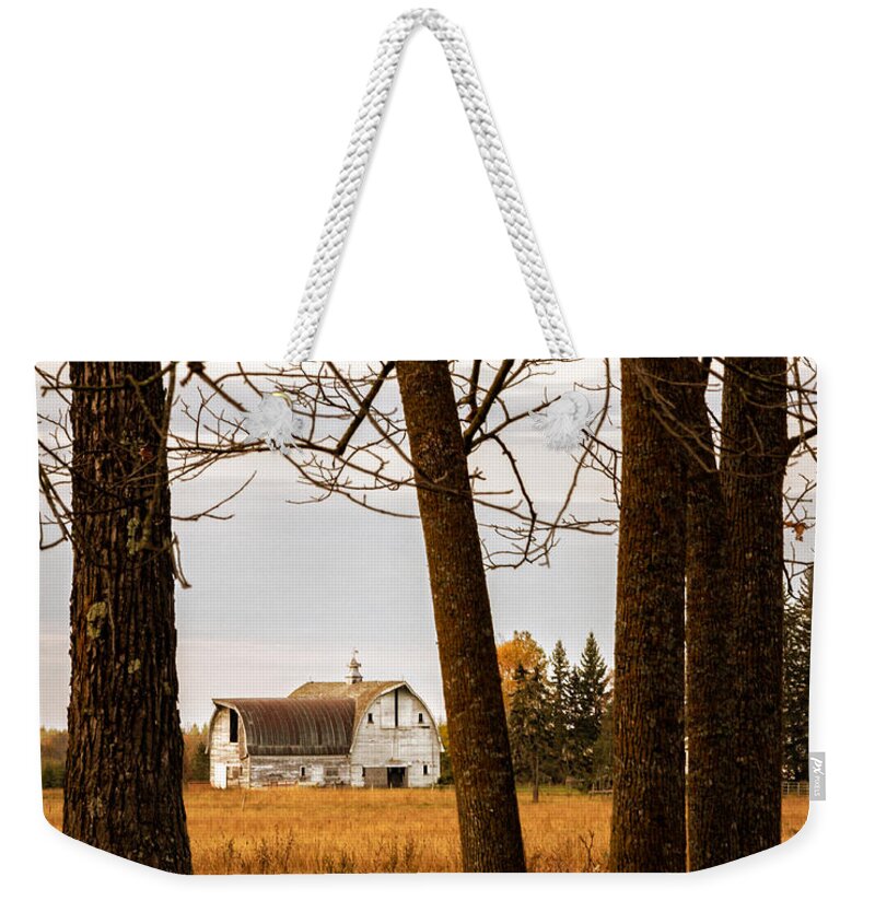 Old Weathered Barn Weekender Tote Bag featuring the photograph Beautifully weathered by Lori Dobbs