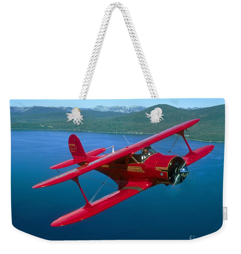Horizontal Weekender Tote Bag featuring the photograph Beechcraft Model 17 Staggerwing Flying by Phil Wallick
