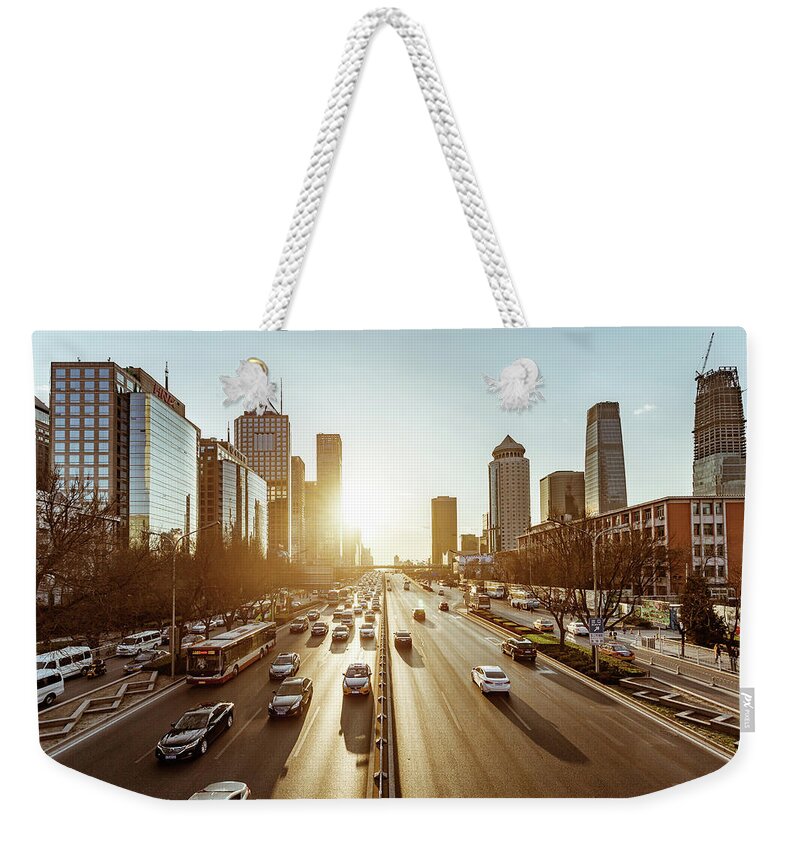 Downtown District Weekender Tote Bag featuring the photograph Beijing Traffic by Dukai Photographer