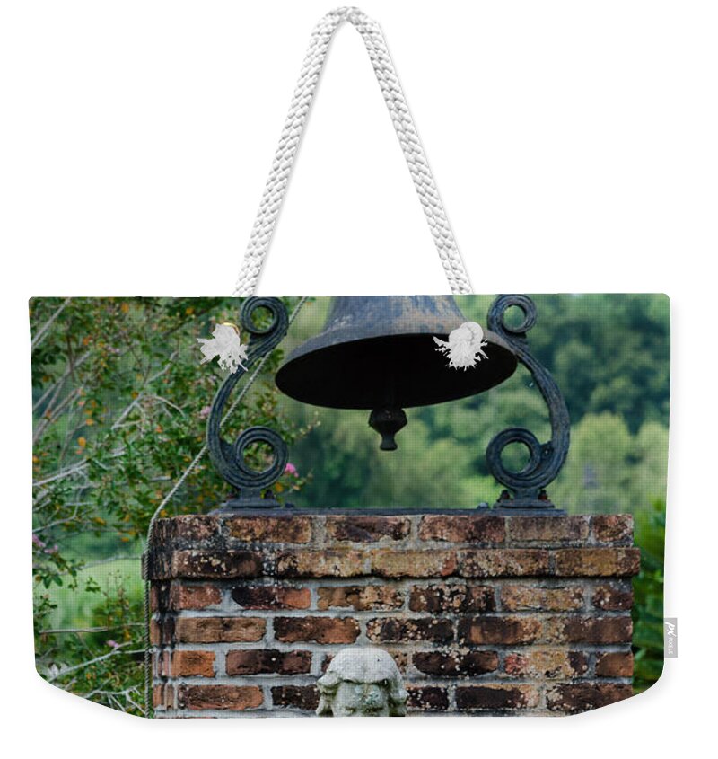 Bell Weekender Tote Bag featuring the photograph Bell Brick And Statue by Jim Shackett