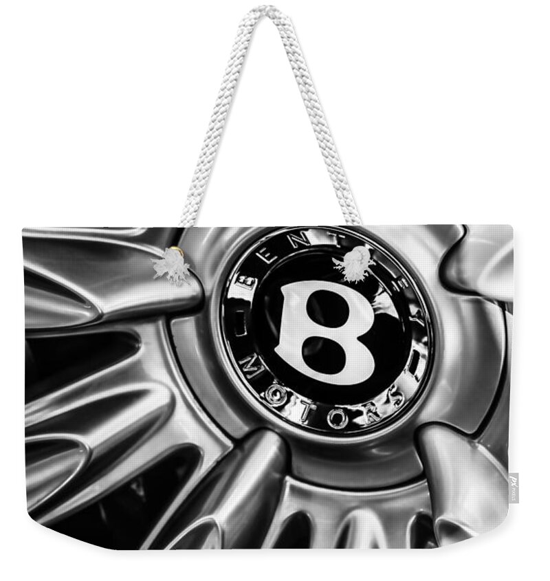 Bentley Wheel Emblem Weekender Tote Bag featuring the photograph Bentley Wheel Emblem -0303bw by Jill Reger