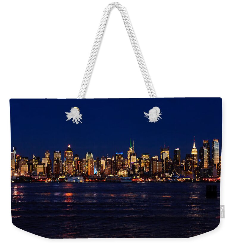 Best New York Skyline Photos Weekender Tote Bag featuring the photograph Big Apple Skyline from New Jersey by Mitchell R Grosky