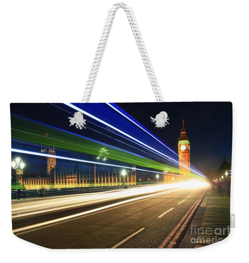 London Weekender Tote Bag featuring the photograph Big Ben and a Bus by Jeremy Hayden
