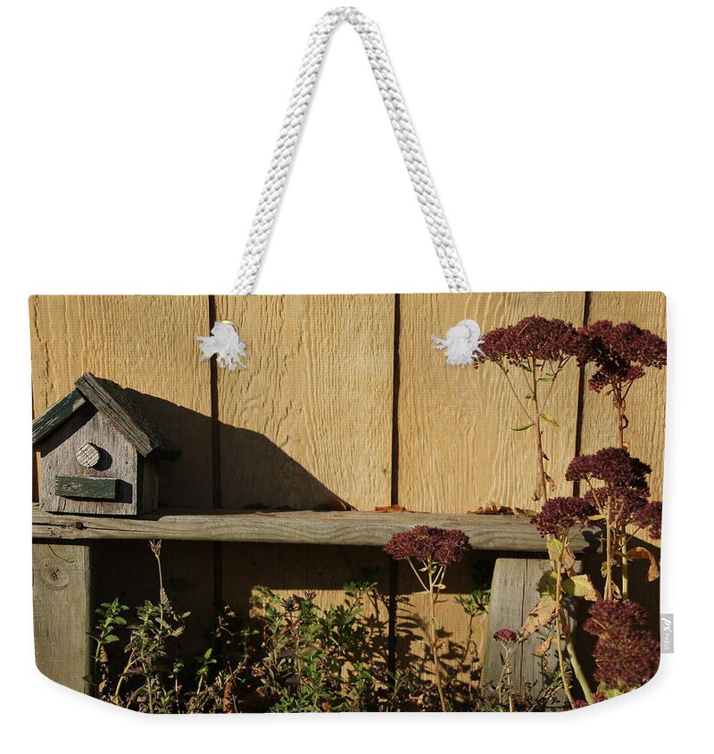 Bird House Weekender Tote Bag featuring the photograph Bird House on Bench by Valerie Collins