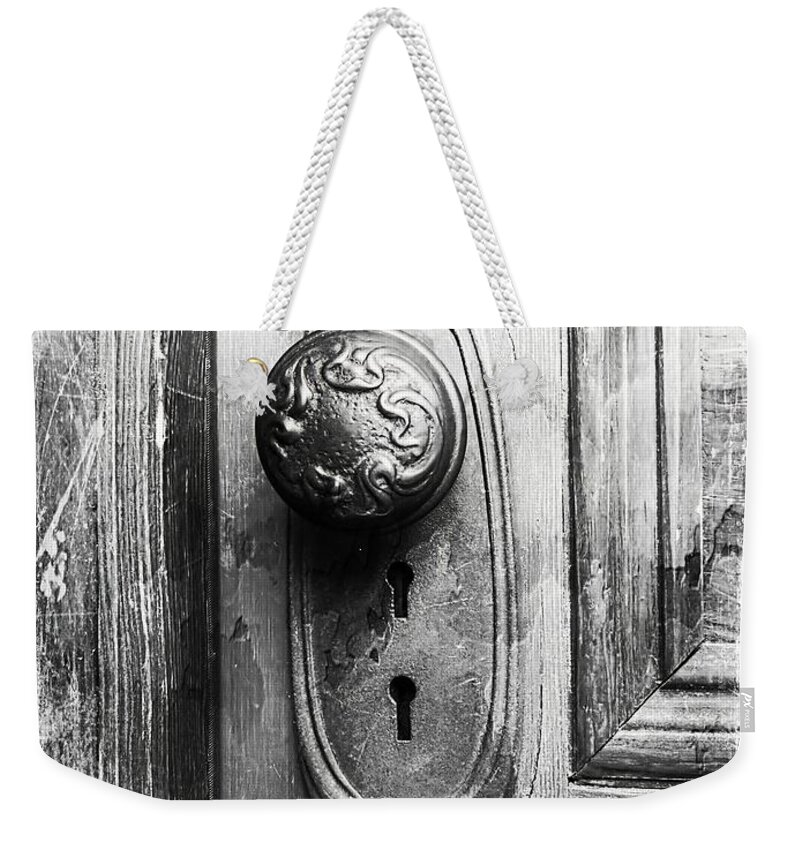 Door Knob Weekender Tote Bag featuring the photograph Black and White Distressed Door Knob by Melissa Bittinger