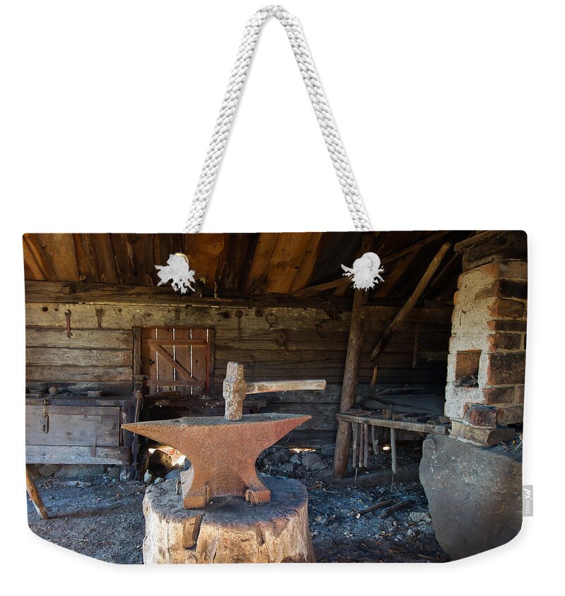 Blacksmiths Tools Weekender Tote Bag featuring the photograph Blacksmiths tools by Torbjorn Swenelius