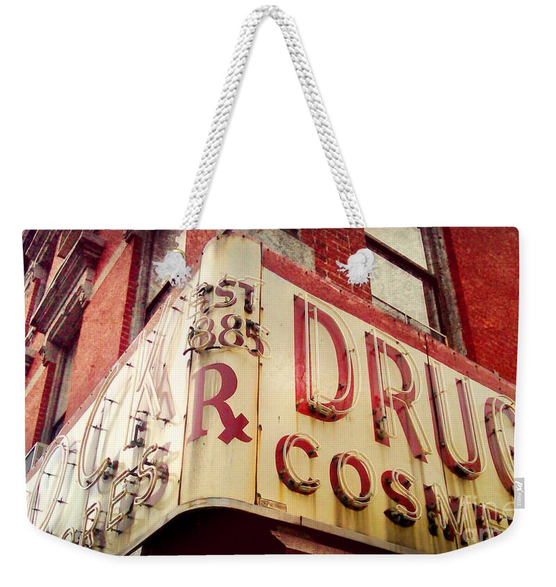 New York City Weekender Tote Bag featuring the photograph Block Drug Store 1885 by Beth Ferris Sale