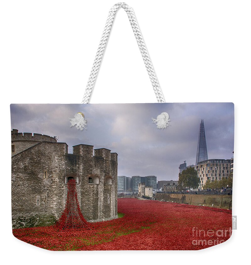 Red Weekender Tote Bag featuring the photograph Blood Swept Lands by Chris Thaxter
