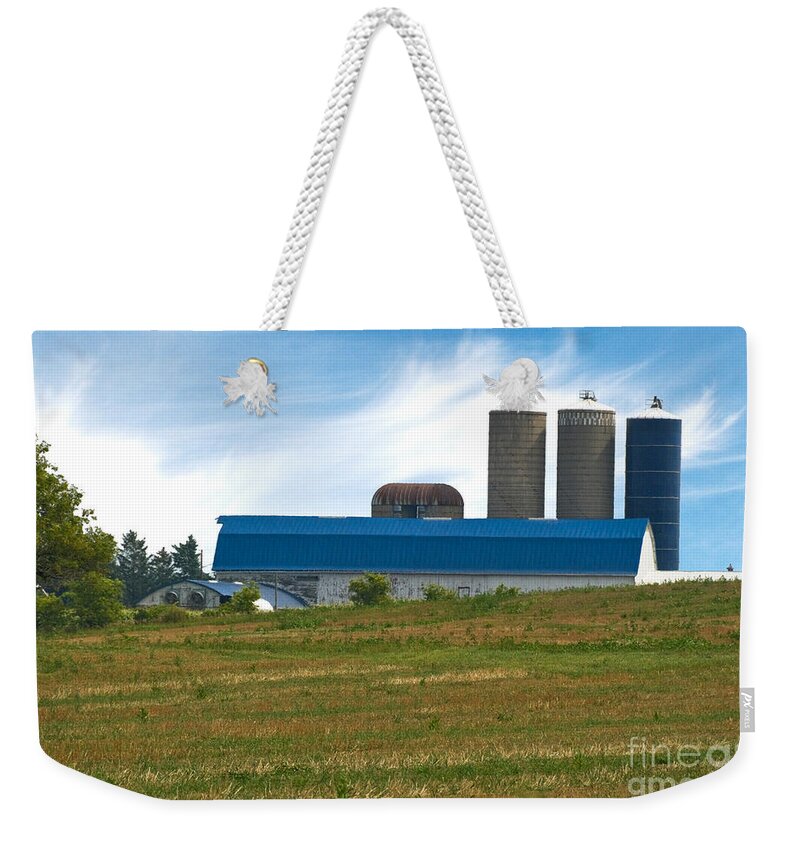Agriculture Weekender Tote Bag featuring the photograph Blue Barn And Silos by Richard and Ellen Thane