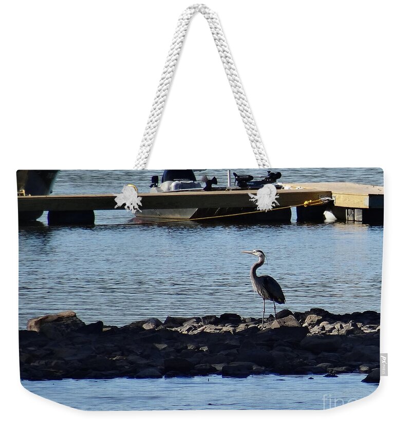Birds Weekender Tote Bag featuring the photograph Blue Heron by the dock by Christopher Plummer