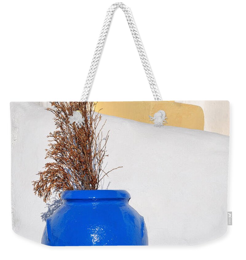 Santorini Weekender Tote Bag featuring the photograph Blue pot in Oia town #2 by George Atsametakis