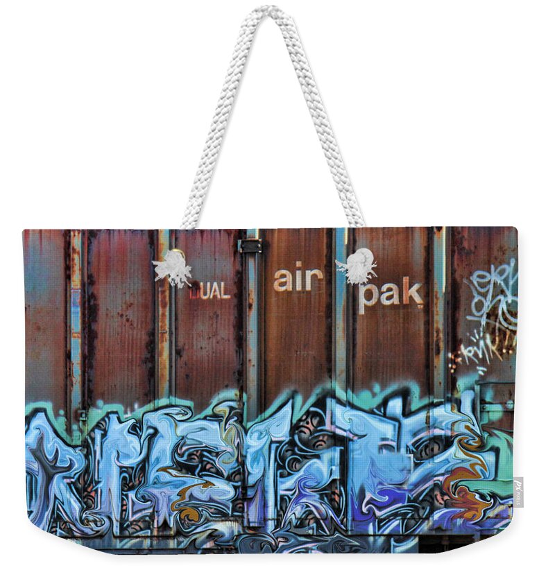 Blue Graffiti Weekender Tote Bag featuring the photograph Blue Rust by Sylvia Thornton