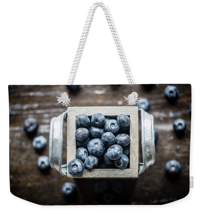Wood Weekender Tote Bag featuring the photograph Blueberries by Lacaosa