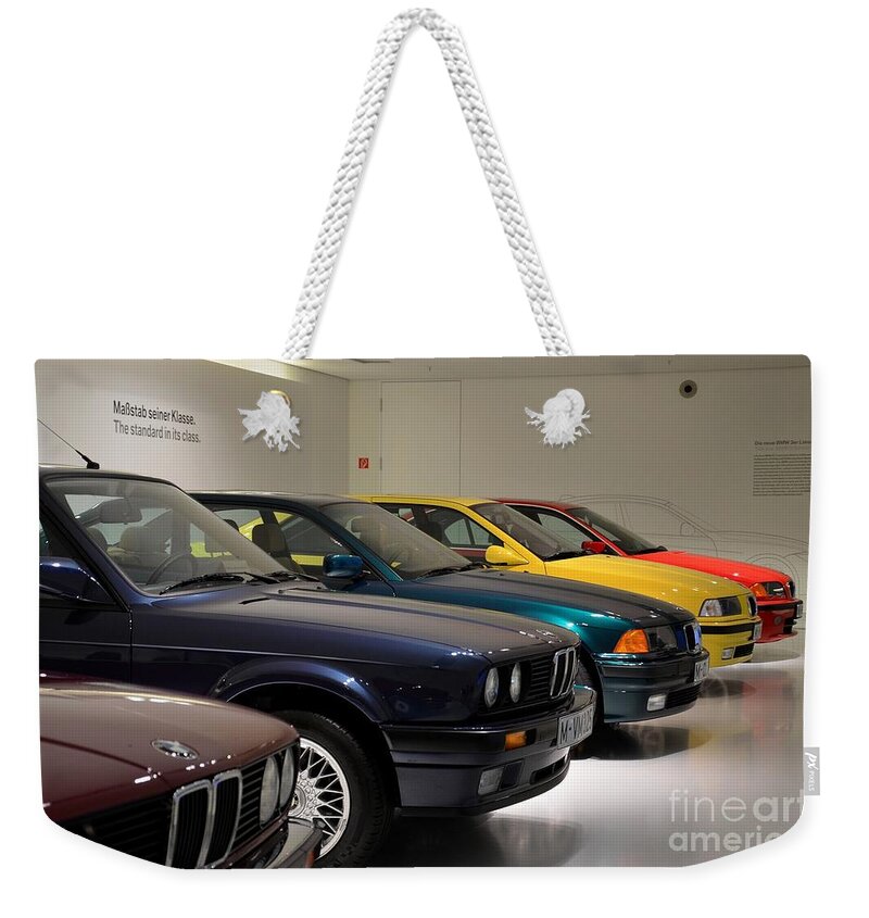 Cars Weekender Tote Bag featuring the photograph BMW cars through the years Munich Germany by Imran Ahmed