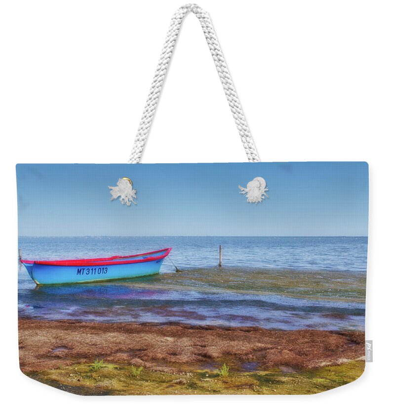 Boat Weekender Tote Bag featuring the photograph Boat at the pond by Roberto Pagani