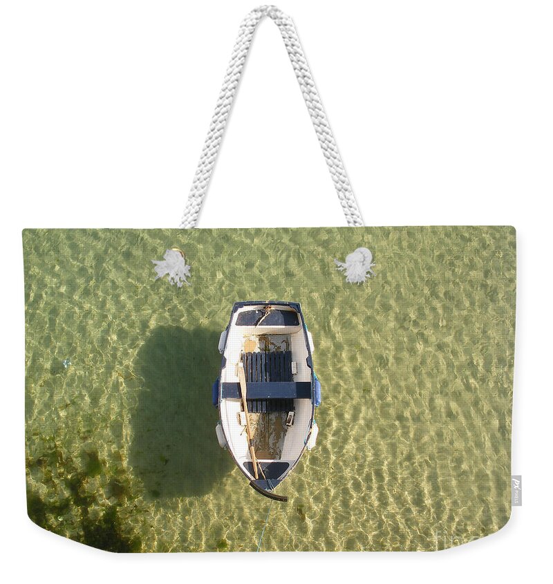 Boat Weekender Tote Bag featuring the photograph Boat on ocean by Pixel Chimp