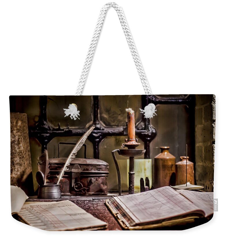 Bookkeeper Weekender Tote Bag featuring the photograph Book Keeper by Heather Applegate