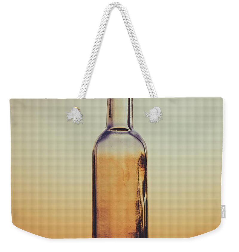 Beautiful Sunset Weekender Tote Bag featuring the photograph Bottled Sunset by Marco Oliveira