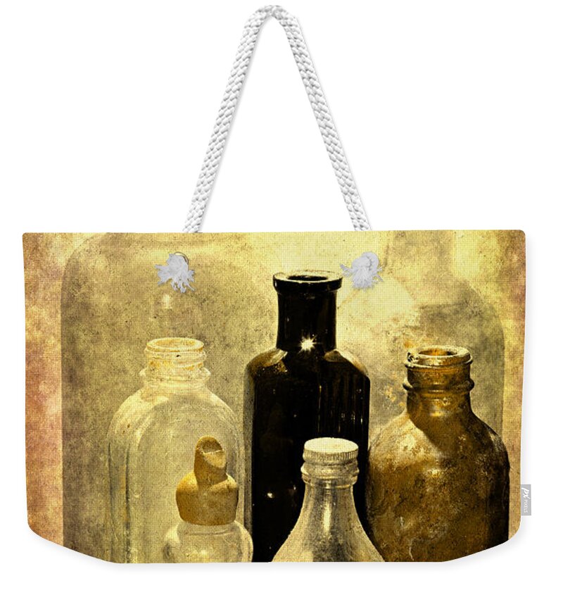 Bottles Weekender Tote Bag featuring the photograph Bottles From The Past by Phyllis Denton