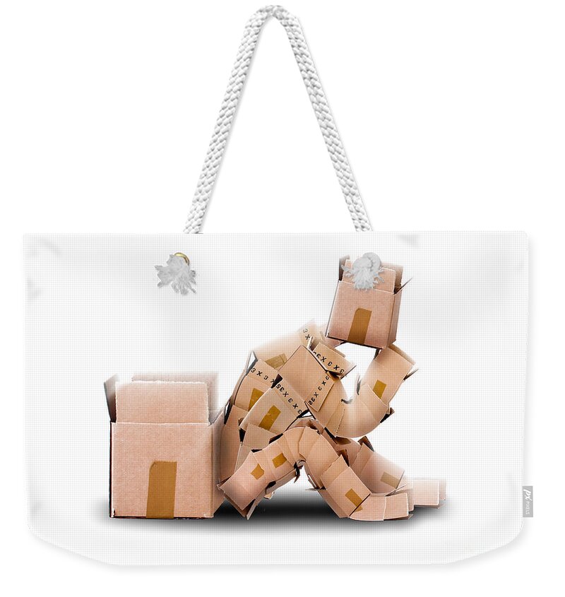 Box Weekender Tote Bag featuring the photograph Box character sat thinking by Simon Bratt