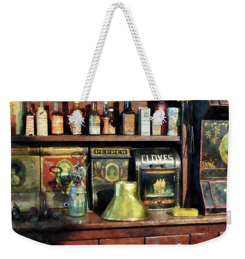 General Store Weekender Tote Bag featuring the photograph Brass Funnel and Spices by Susan Savad