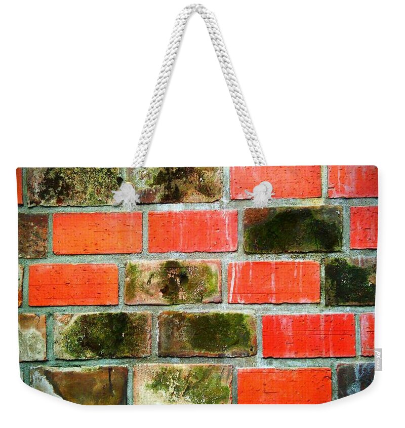 Bricks Weekender Tote Bag featuring the photograph Brick Wall by Eena Bo