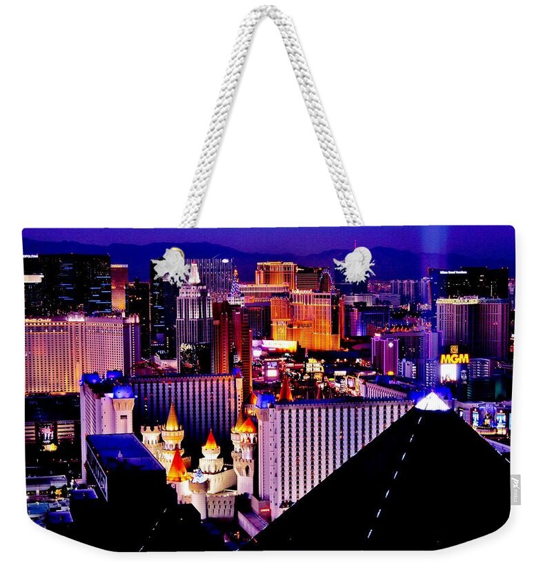 Las Vegas Weekender Tote Bag featuring the photograph Bright Lights of Vegas by Benjamin Yeager