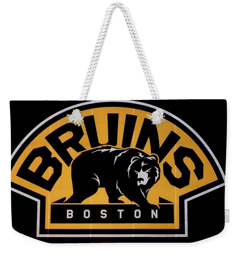 Boston Weekender Tote Bag featuring the photograph Bruins in Boston by Caroline Stella