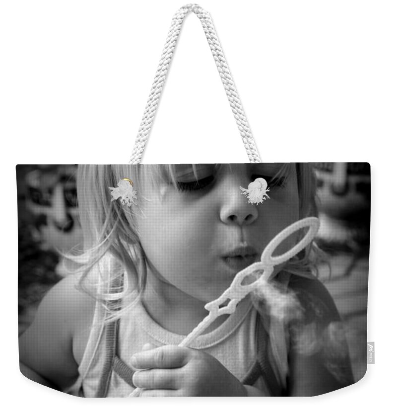 Bubble Weekender Tote Bag featuring the photograph Bubble Fun by Laurie Perry