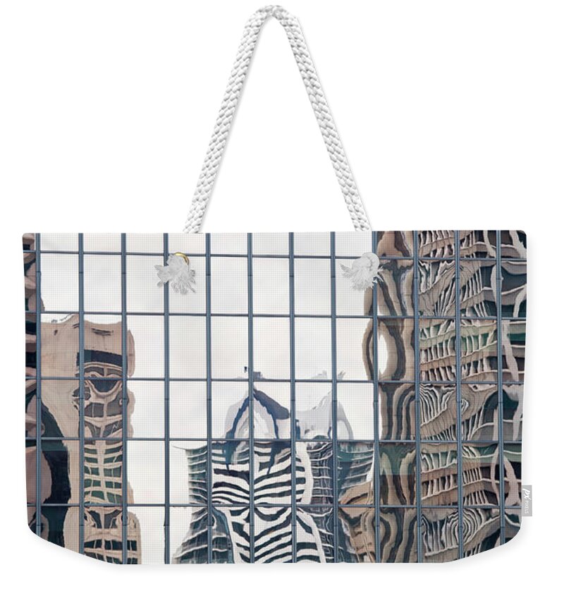 Downtown District Weekender Tote Bag featuring the photograph Buildings Reflected In Mirrored Windows by Tobias Titz
