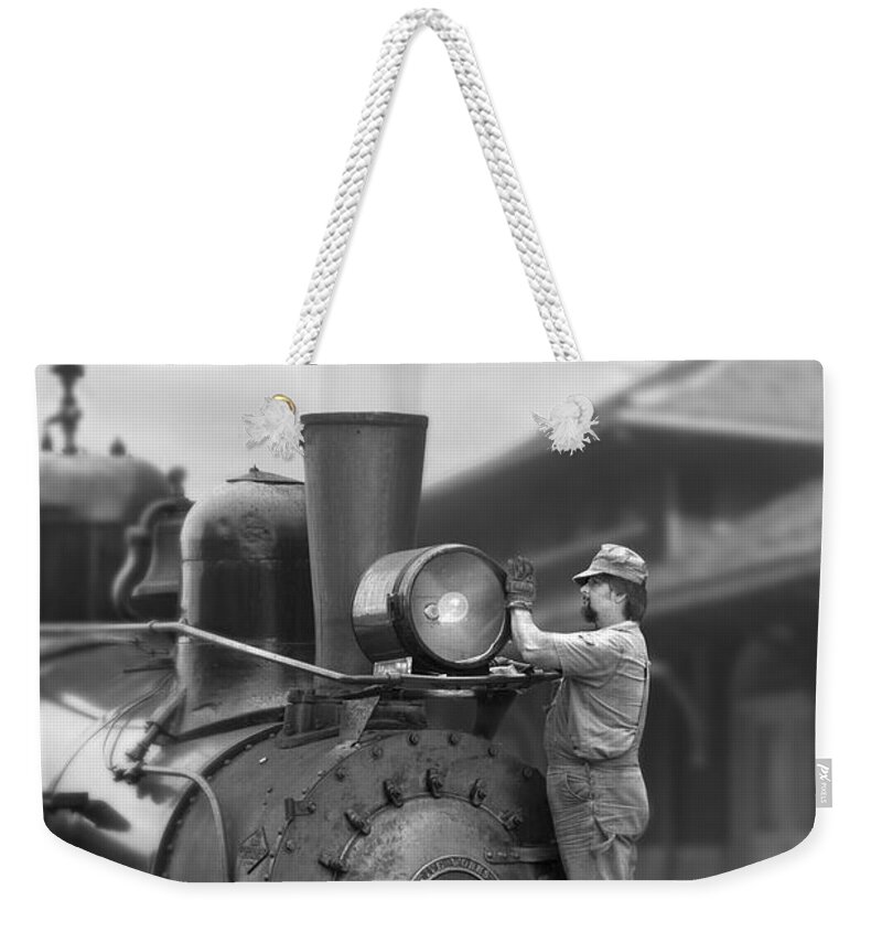 Transportation Weekender Tote Bag featuring the photograph Bulb Change by Mike McGlothlen