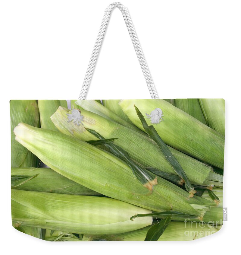 Corn Weekender Tote Bag featuring the photograph Bunch of corn in husk by James BO Insogna