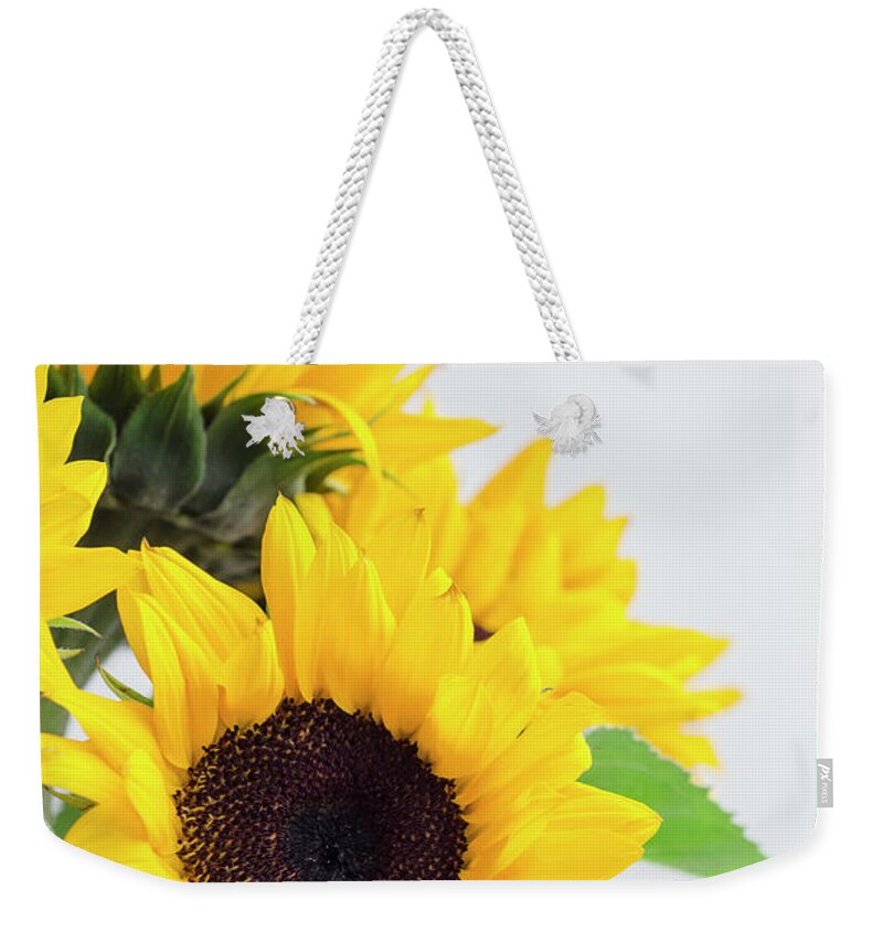 White Background Weekender Tote Bag featuring the photograph Bunch Of Sunflowers by Antonio Rosario