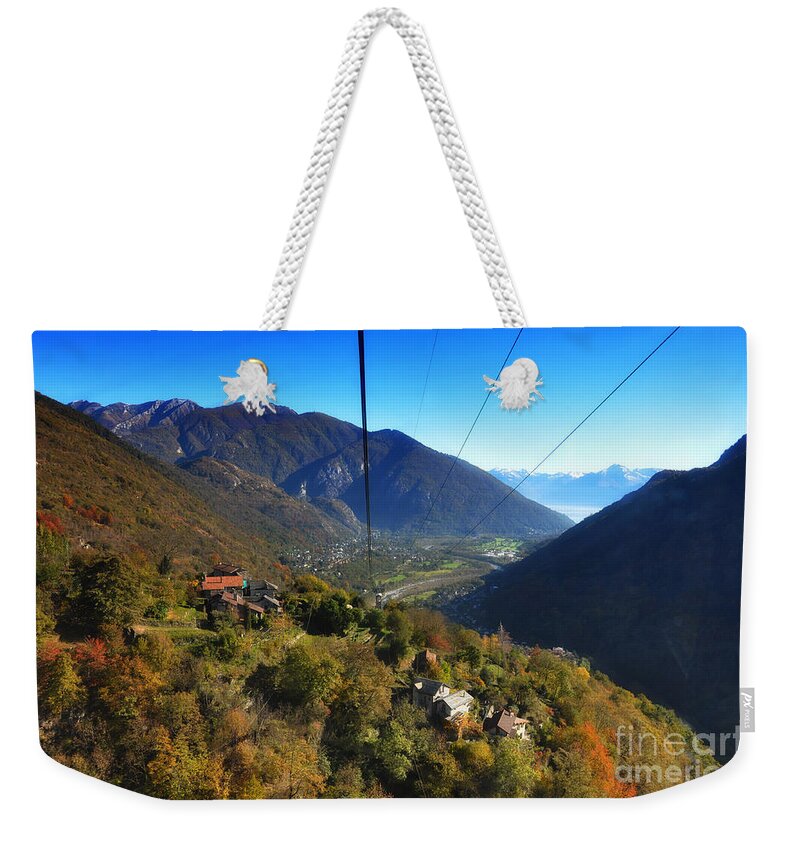 Cableway Weekender Tote Bag featuring the photograph Cableway over the mountain by Mats Silvan