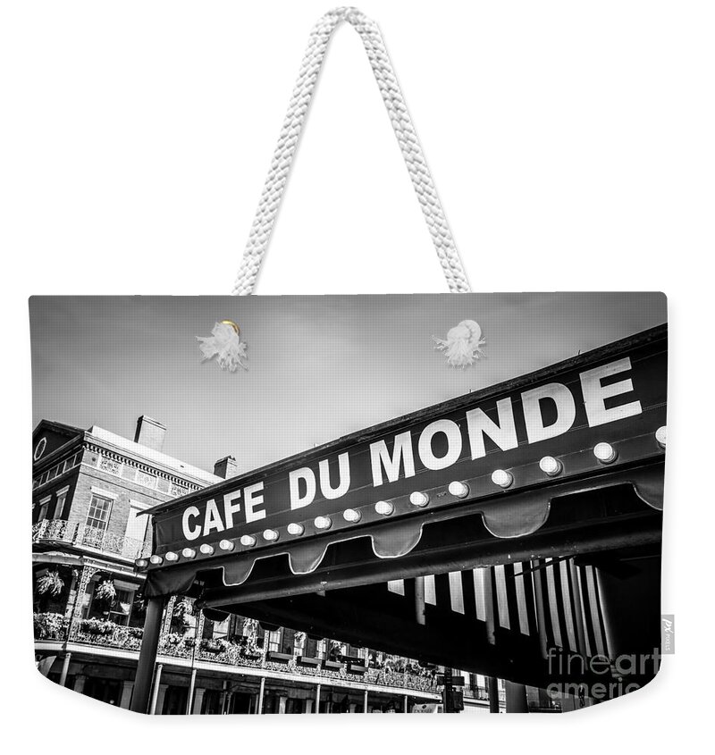 America Weekender Tote Bag featuring the photograph Cafe Du Monde Black and White Picture by Paul Velgos