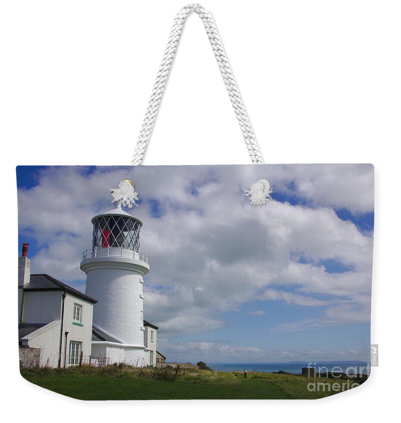 Tenby Weekender Tote Bag featuring the photograph Caldey Island Lighthouse by Jeremy Hayden