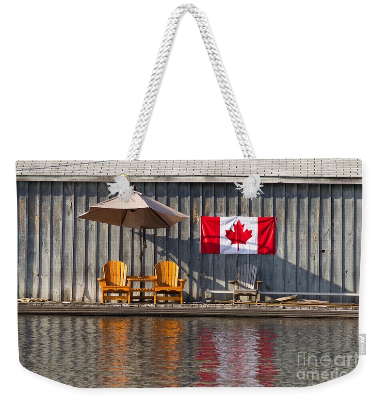 Chair Weekender Tote Bag featuring the photograph Canada Day in Muskoka by Les Palenik