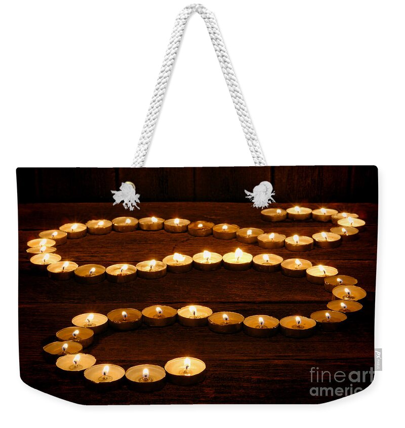 Zen Weekender Tote Bag featuring the photograph Candle Path by Olivier Le Queinec