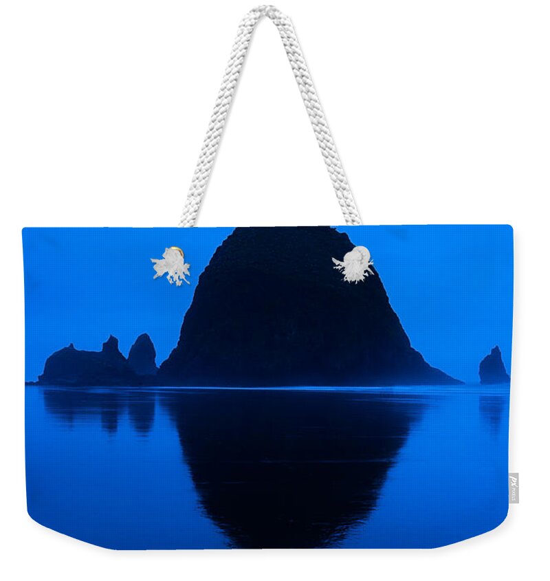 Cannon Beach Weekender Tote Bag featuring the photograph Cannon Beach Blue by Mark Rogers