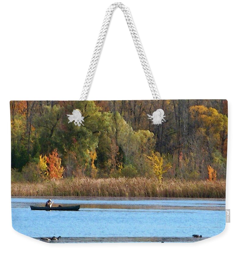 Canoe Weekender Tote Bag featuring the photograph Canoer by Aimee L Maher ALM GALLERY