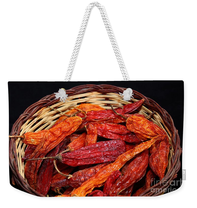 Food And Beverage Weekender Tote Bag featuring the photograph Capsicum baccatum chilis by James Brunker