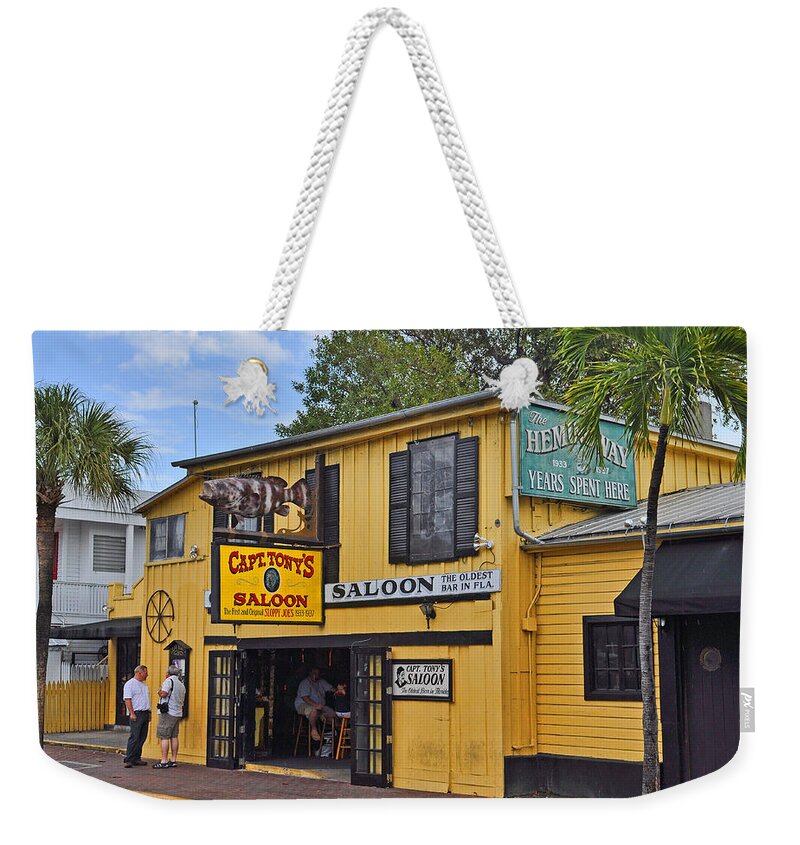Captain Tonys Saloon Weekender Tote Bag featuring the photograph Captain Tony's Saloon by Chris Thaxter