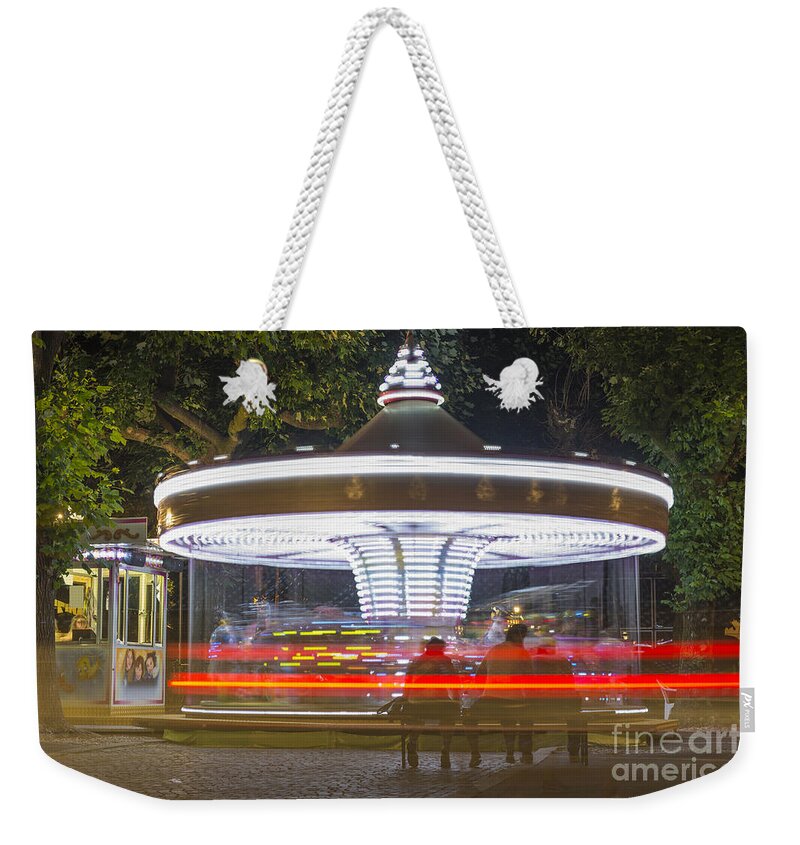 Carousel Weekender Tote Bag featuring the photograph Carousel by Mats Silvan