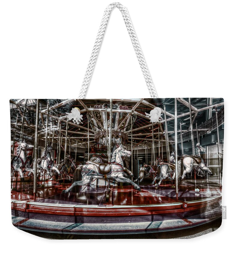 Carousel Weekender Tote Bag featuring the photograph Carousel by Wayne Sherriff