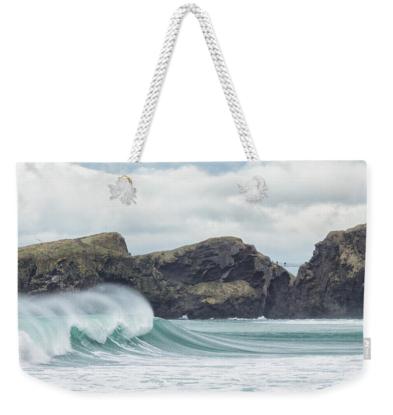 Carrick-a-rede Weekender Tote Bag featuring the photograph Carrick-a-Rede Rope Bridge by Nigel R Bell