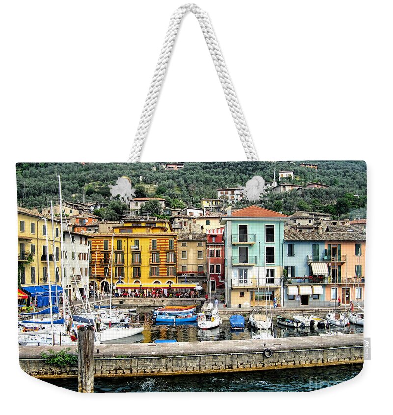 Castelletto Di Brenzone Weekender Tote Bag featuring the photograph Castelleto Harbor.Italy by Jennie Breeze